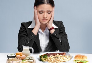 Sad business woman with  personal organizer.