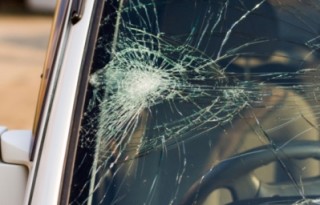 web of splits on the triplex windscreen